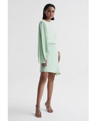 Reiss - Christy - Sage Cape Sleeve Asymmetric Mini Dress, Us 6 - Lyst