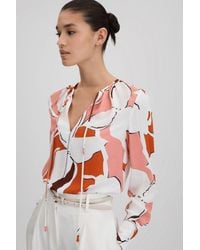 Reiss - Tess - Cream/red Printed Tie Neck Blouse - Lyst
