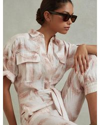 Reiss - Linen Tropical Print Belted Jumpsuit - Lyst