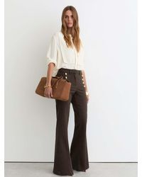 Reiss - Button-Detail High-Rise Flared Jeans - Lyst