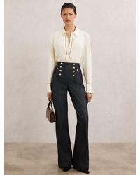 Reiss - Button-Detail Flared Jeans - Lyst
