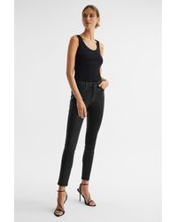 PAIGE - Black Hoxton Coated Skinny Jeans - Lyst