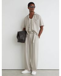 Reiss - Belted Relaxed-Fit Pleated Trousers - Lyst