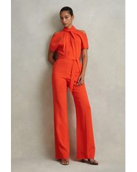 Reiss - Amari - Orange Split Sleeve Twist Neck Jumpsuit - Lyst