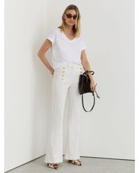 Reiss - Athena Button-Detail High-Rise Flared Jeans - Lyst
