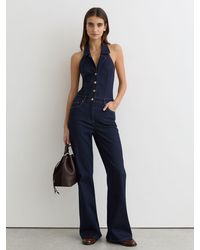 Reiss - Denim Halterneck Flared Jumpsuit - Lyst