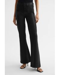 PAIGE - Genevieve - Flared Coated Jeans, Black - Lyst