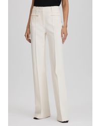 Reiss - Claude - Cream Petite High Rise Flared Trousers, Us 0 - Lyst