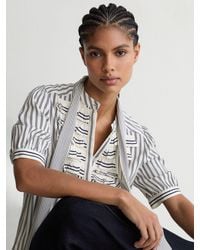 Reiss - Striped Ruffle-Trim Tie-Neck Blouse - Lyst
