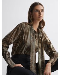 Reiss - Kendall - Gold Metallic Animal Print Tie Neck Blouse, Us 0 - Lyst