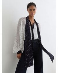 Reiss - Arial - Ivory/navy Polka-dot Tie-neck Blouse, Us 4 - Lyst