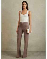 Reiss - Petite High Rise Flared Trousers - Lyst