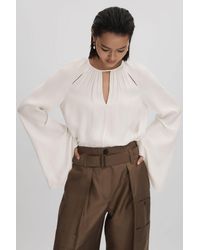 Reiss - Gracie - Ivory Cut-out Flute Sleeve Blouse - Lyst