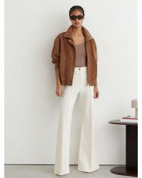 Reiss - Petite Patch-Pocket Flared Jeans - Lyst