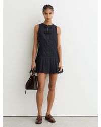 Reiss - Sleeveless Pleated Denim Mini Dress - Lyst