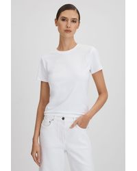 GOOD AMERICAN - Good White Good Cropped Cotton Crew Neck T-shirt - Lyst