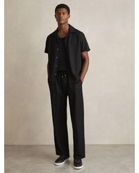 Reiss - Textured-Knit Tapered Trousers - Lyst