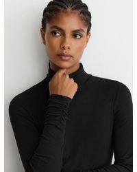 Reiss - Rib-Knit Roll-Neck Top - Lyst