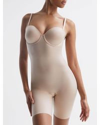 Spanx - Champagne Shapewear Firming Strapless Mid-thigh Bodysuit With Cups - Lyst