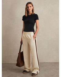 Reiss - Petite Side-Stripe Wide-Leg Trousers - Lyst