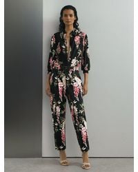 ATELIER - Cotton Floral-print Tapered Black Trousers - Lyst