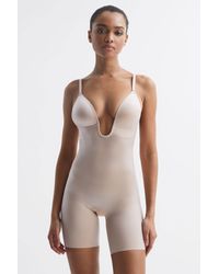 Spanx - Shapewear Plunge Low-back Mid-thigh Bodysuit, Champagne - Lyst