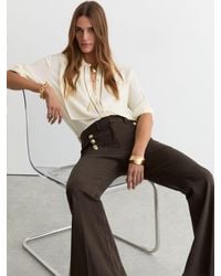 Reiss - Button-Detail Flared Jeans - Lyst