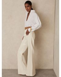 Reiss - Petite Patch-Pocket Flared Jeans - Lyst
