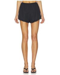 Hunza G - Frill Mini Shorts - Lyst