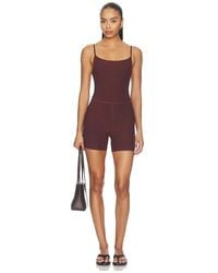 Beyond Yoga - Spacedye Keep Pace Biker Romper - Lyst