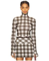 Norma Kamali - Slim Fit Long Sleeve Turtleneck Top - Lyst