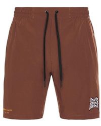 Rivvia Projects - Daily Ride Puffer Swim Short - Lyst