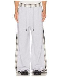 Feng Chen Wang - Patched Panel Jersey Trousers - Lyst