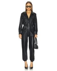 Norma Kamali - Turtleneck Cargo Jumpsuit - Lyst