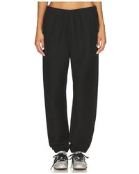 Champion - Essentials Reverse Weave Cinched Bottom Sweatpant - Lyst