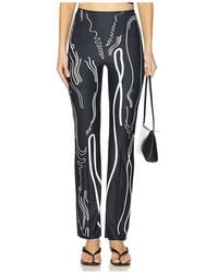 DI PETSA - Venus Shell Lycra Trousers - Lyst