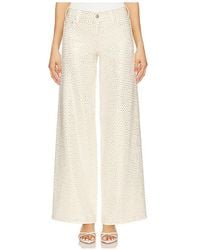 Alice + Olivia - Trish Low Rise Embellished Baggy Jeans - Lyst