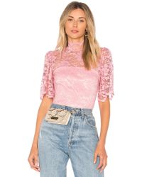 Ganni Bodysuits for Women - Up to 70% off at Lyst.com