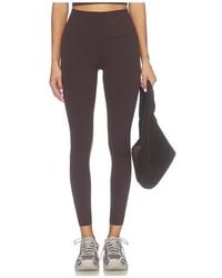 Beyond Yoga - Glowzone High Waisted Midi Legging - Lyst