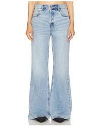 GRLFRND - Tiefgeschnittene Hose Mit Lässiger Passform Und Ausgestelltem Bein Jade - Lyst