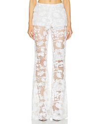 AKNVAS - X Revolve Lennon Embroidered Trousers - Lyst