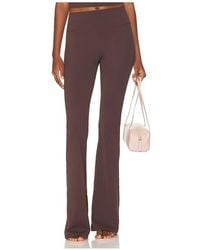 Runaway the Label - Kiara High Rise Flared Leggings - Lyst