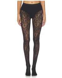 Wolford - Infinite Rose Net Tights - Lyst