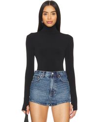 Norma Kamali - Slim Fit Long Sleeve Turtleneck Top En Color Negro Talla (También En M, Xs) - Lyst