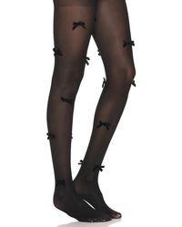 petit moments - Bow Tights - Lyst