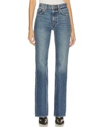 GRLFRND - X Lindsi Lane Melanie Petite High Rise Boot Cut Jeans En Color Denim-Medium Talla (También En 25, 26, 27, 28, 29, 30, 31, 32) - Lyst