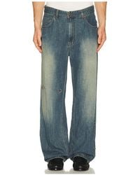 we11done - Piercing Denim Jeans - Lyst