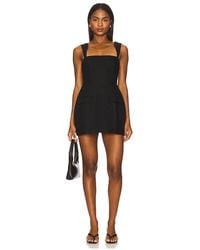 Amanda Uprichard - Mono De Lino Con Falda Pantalón Bethany En Color Negro Talla (También En M, S, Xl, Xs) - Lyst