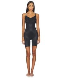 Spanx - Shape Invisible Shaping Closed Bust Mid-Thigh Bodysuit - Lyst