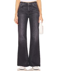 GRLFRND - JEANS JADE LOW RISE RELAXED FLARE - Lyst